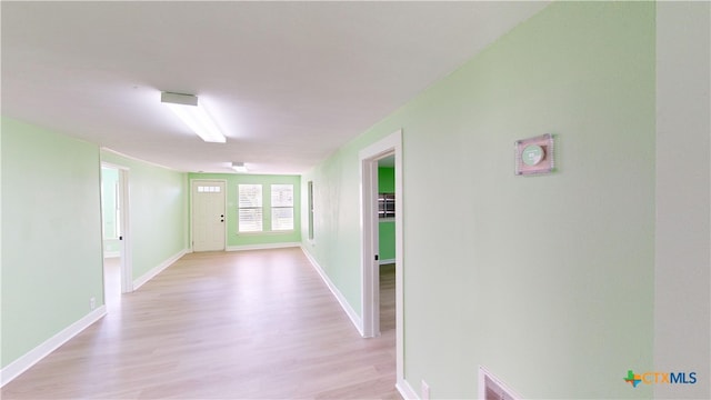 hall featuring light wood-type flooring