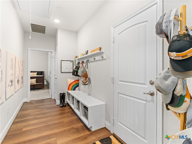 4508 River Rock Rd, Marion, TX 78124 - mudroom featuring attic access, light wood-style flooring, recessed lighting, and baseboards