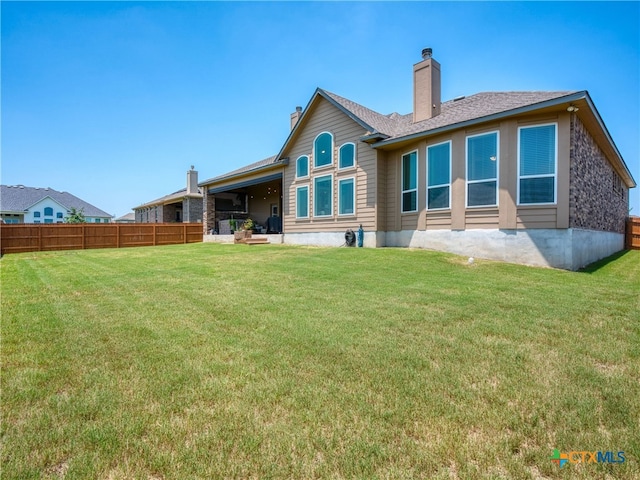 4508 River Rock Rd, Marion, TX 78124 - back of property featuring a chimney