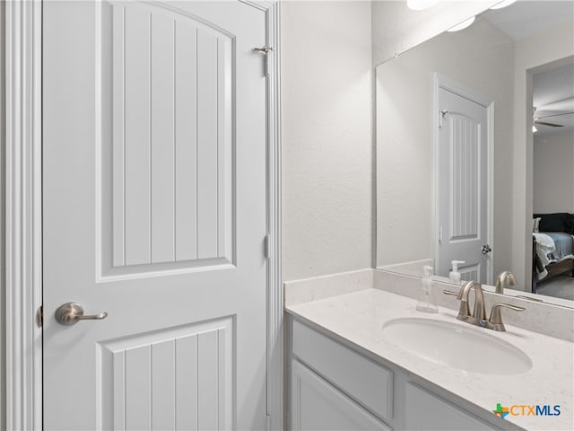 4508 River Rock Rd, Marion, TX 78124 - ensuite bathroom with vanity and ceiling fan