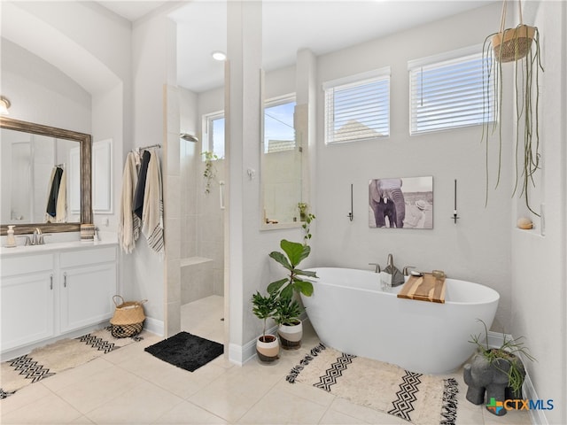 4508 River Rock Rd, Marion, TX 78124 - bathroom with vanity, plenty of natural light, a soaking tub, and a walk in shower