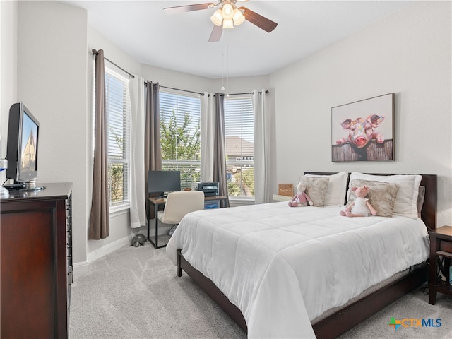 4508 River Rock Rd, Marion, TX 78124 - bedroom featuring carpet flooring, baseboards, ceiling fan, and an office area