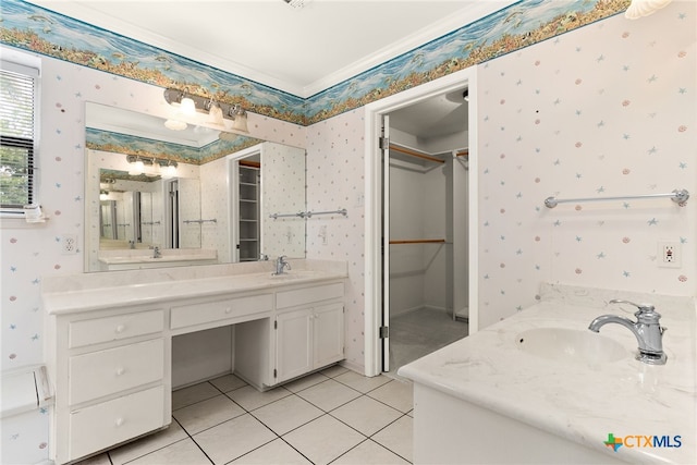 bathroom featuring tile patterned floors, vanity, and crown molding