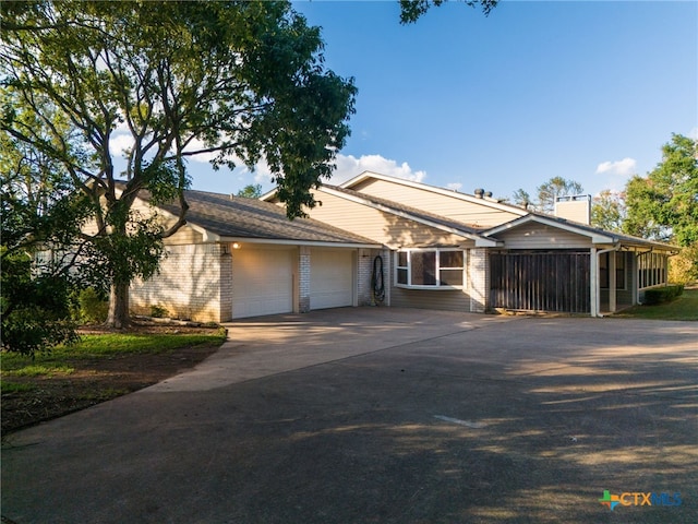 view of front of property featuring a garage