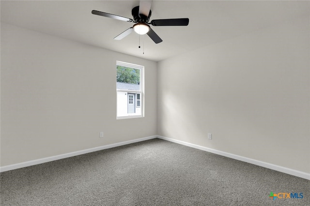 760 Lookout Dr, Canyon Lake, TX 78133 - carpeted spare room with baseboards and a ceiling fan