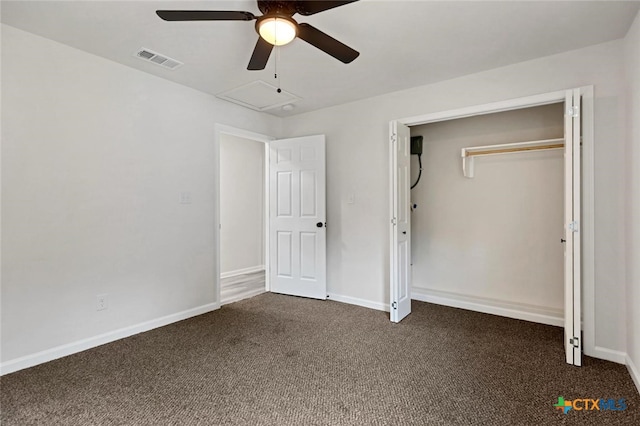 760 Lookout Dr, Canyon Lake, TX 78133 - unfurnished bedroom with dark colored carpet, a ceiling fan, and a closet