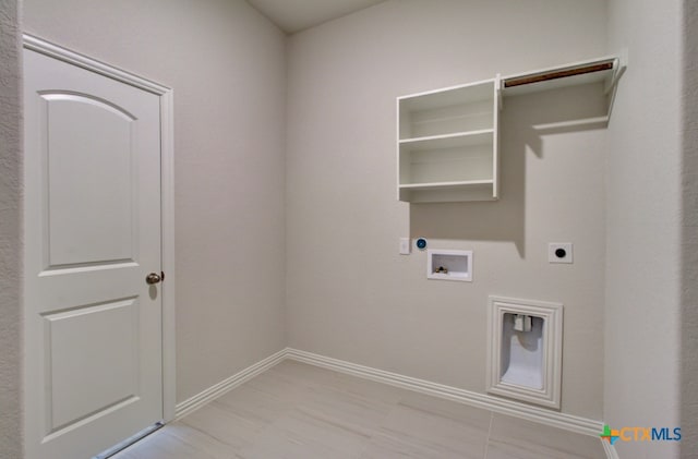 washroom featuring hookup for a washing machine and electric dryer hookup