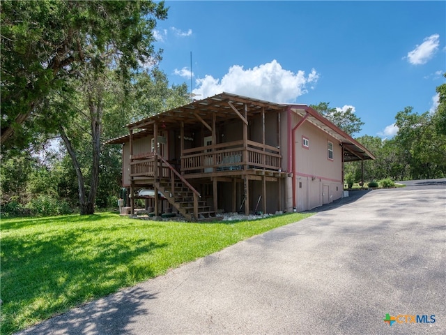 4386 Morningside Way, Canyon Lake, TX 78133 - view of front of house featuring a front lawn and stairs