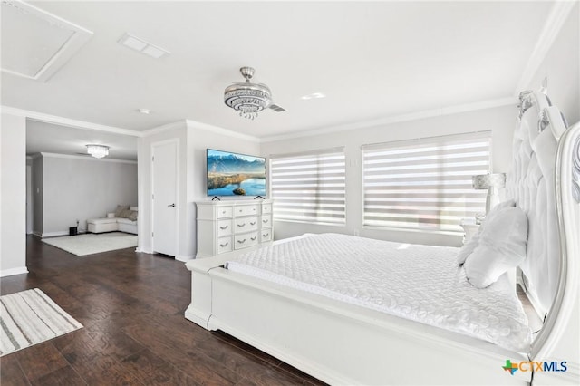 bedroom with crown molding, ceiling fan, and dark hardwood / wood-style floors