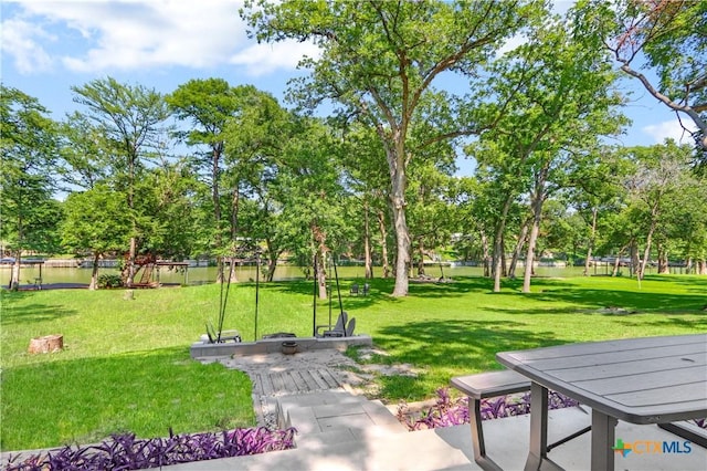 326 Riverview Rd, Mcqueeney, TX 78123 - view of community with a lawn and view of scattered trees