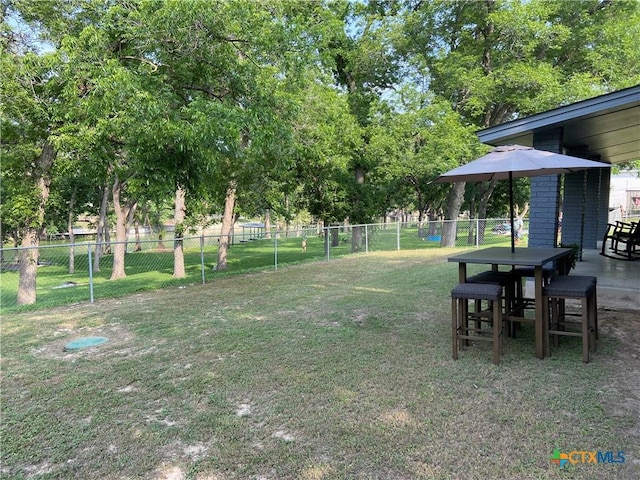 326 Riverview Rd, Mcqueeney, TX 78123 - view of yard with outdoor dining space