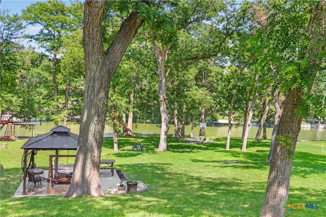 326 Riverview Rd, Mcqueeney, TX 78123 - view of home's community with a gazebo, a yard, a water view, and a patio