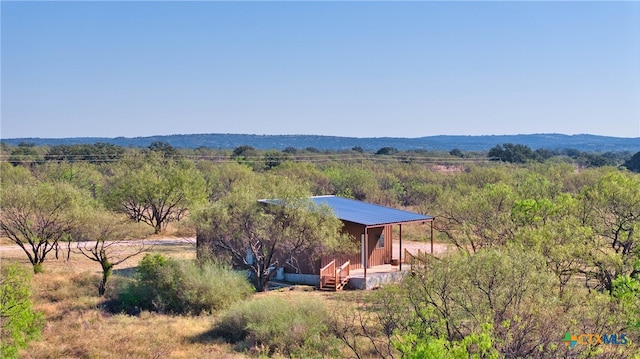 view of mountain feature with a rural view