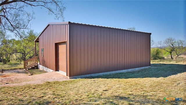 garage with a yard