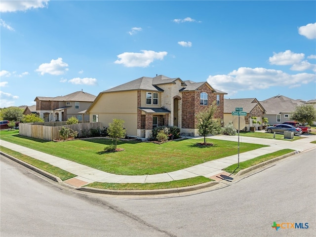 view of front of property featuring a front yard