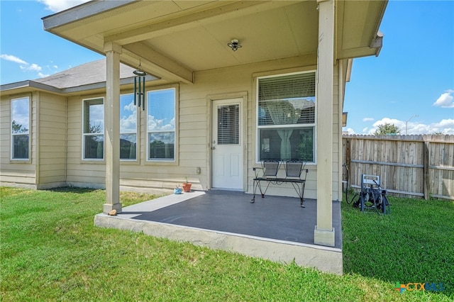 exterior space with a yard and a patio area