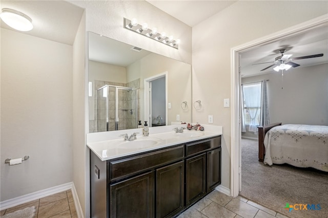 bathroom featuring vanity, ceiling fan, tile patterned floors, and a shower with shower door