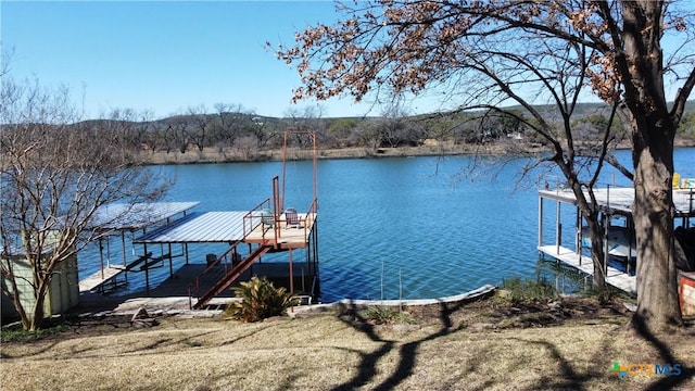 dock area featuring a water view