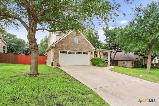 2005 Red Fox Dr, Nolanville, TX 76559 - traditional-style house with a garage, driveway, and brick siding