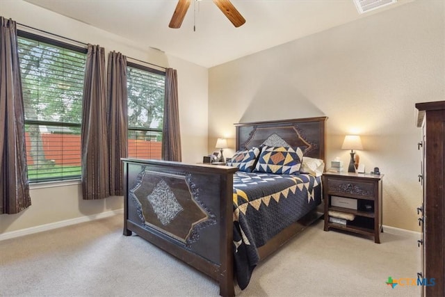 2005 Red Fox Dr, Nolanville, TX 76559 - carpeted bedroom with baseboards and a ceiling fan