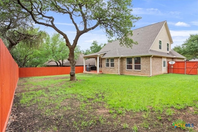 2005 Red Fox Dr, Nolanville, TX 76559 - back of property with brick siding and roof with shingles