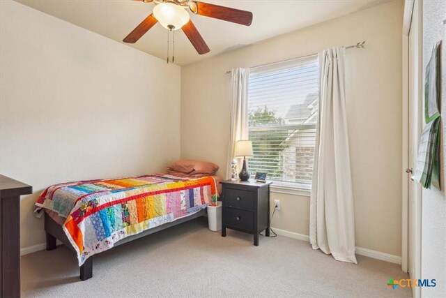 2005 Red Fox Dr, Nolanville, TX 76559 - bedroom with carpet, baseboards, and a ceiling fan