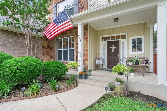 2005 Red Fox Dr, Nolanville, TX 76559 - entrance to property featuring stone siding, board and batten siding, and a porch