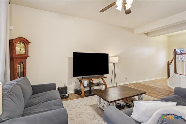 2005 Red Fox Dr, Nolanville, TX 76559 - living room with a ceiling fan, light wood-style flooring, baseboards, and beam ceiling