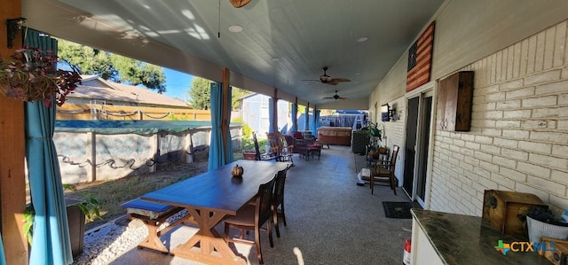 view of patio / terrace featuring ceiling fan