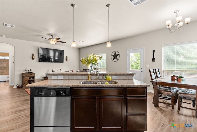 kitchen featuring dishwasher, light hardwood / wood-style floors, a healthy amount of sunlight, and sink