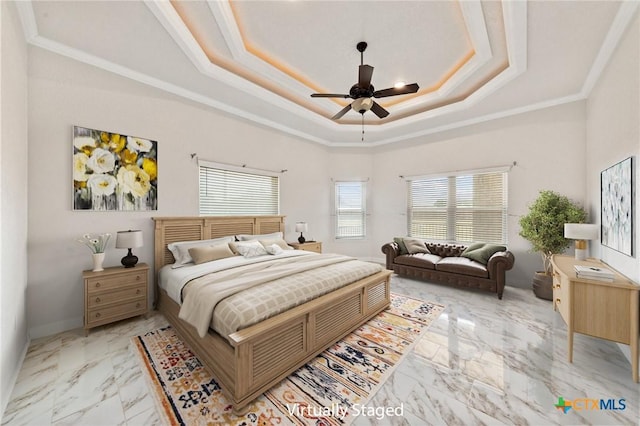 bedroom with a raised ceiling, ceiling fan, and ornamental molding