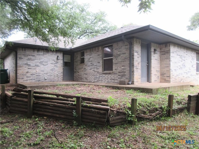 1109 E E Avenue M, Belton, TX 76513 - view of front of property featuring brick siding