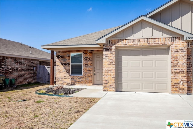 ranch-style house featuring a garage