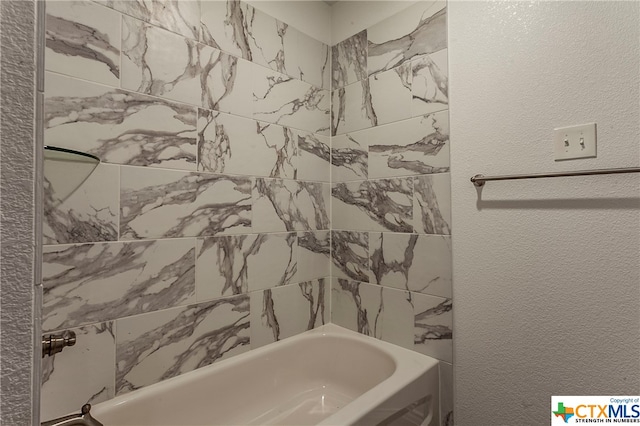 bathroom with a bathing tub