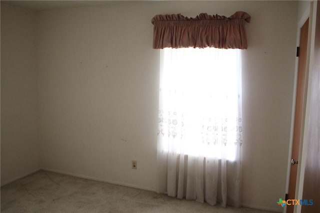 1610 Bexar Ave, Victoria, TX 77901 - empty room with light colored carpet