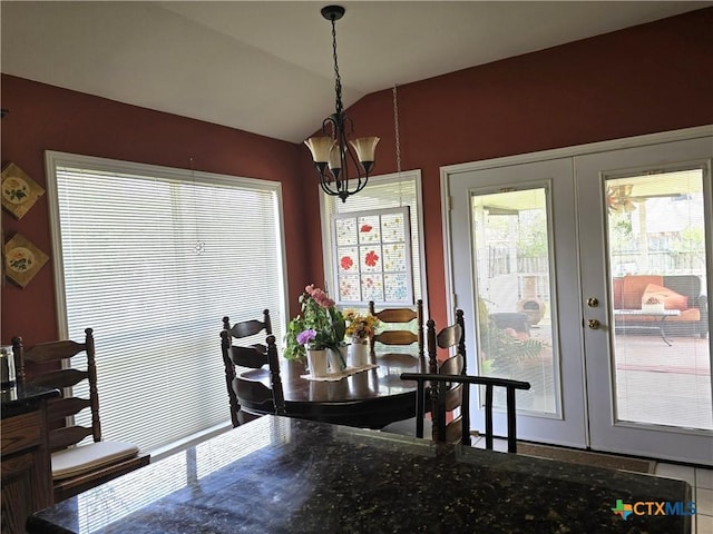 114 Quapaw Dr, Harker Heights, TX 76548 - dining area with french doors, lofted ceiling, and a chandelier