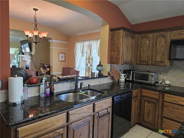114 Quapaw Dr, Harker Heights, TX 76548 - kitchen featuring black appliances, vaulted ceiling, a sink, arched walkways, and tasteful backsplash