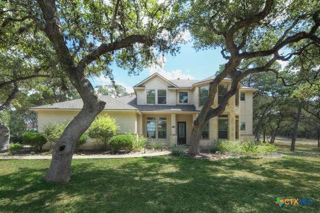 view of front facade with a front lawn