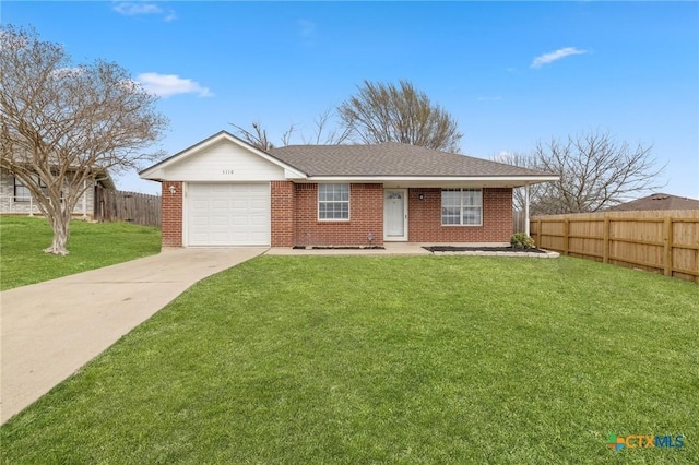 single story home with concrete driveway, an attached garage, fence, and brick siding