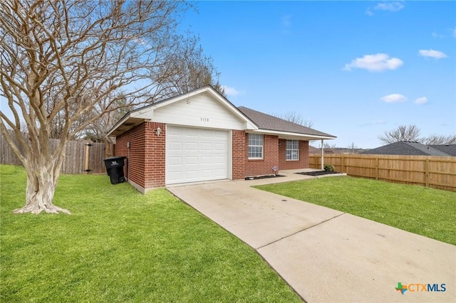 view of home's exterior featuring a garage, brick siding, a yard, and fence