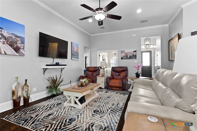 living room featuring ornamental molding, hardwood / wood-style floors, and ceiling fan