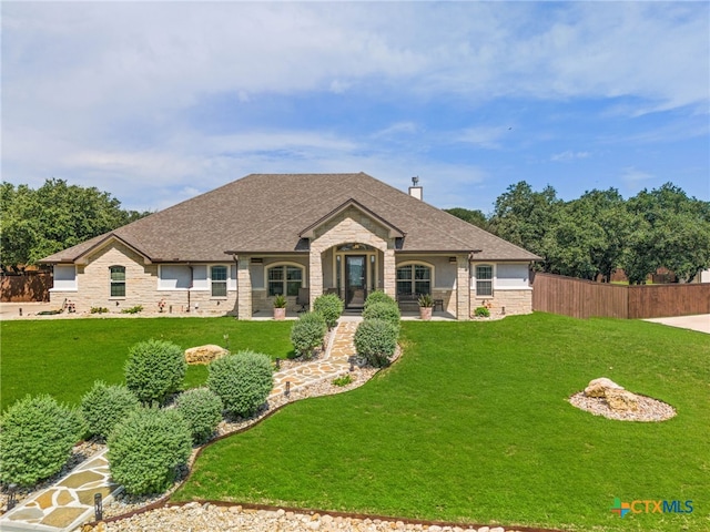 view of front of house with a front lawn