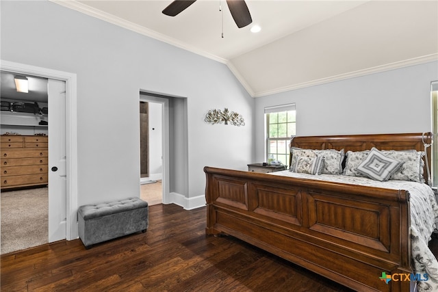 bedroom with ornamental molding, dark hardwood / wood-style flooring, lofted ceiling, ceiling fan, and ensuite bathroom