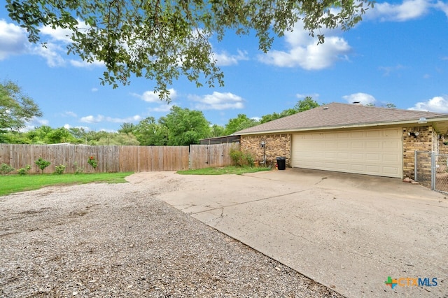 exterior space featuring a garage