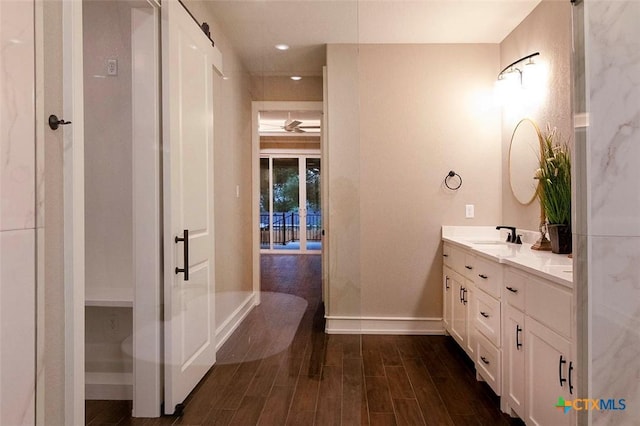 bathroom with vanity and wood-type flooring