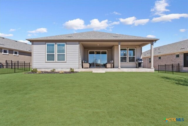 213 Bellows St, Georgetown, TX 78633 - rear view of property with a patio area