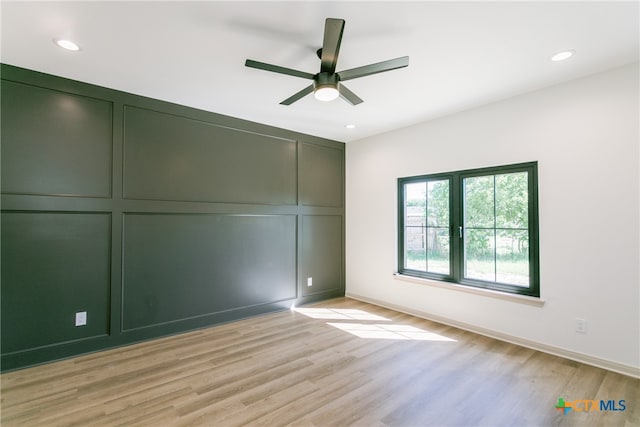 unfurnished bedroom with light wood-type flooring and ceiling fan