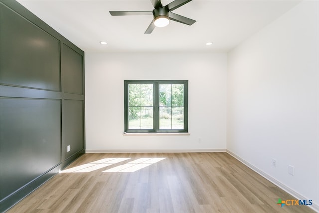 unfurnished bedroom featuring light hardwood / wood-style flooring and ceiling fan