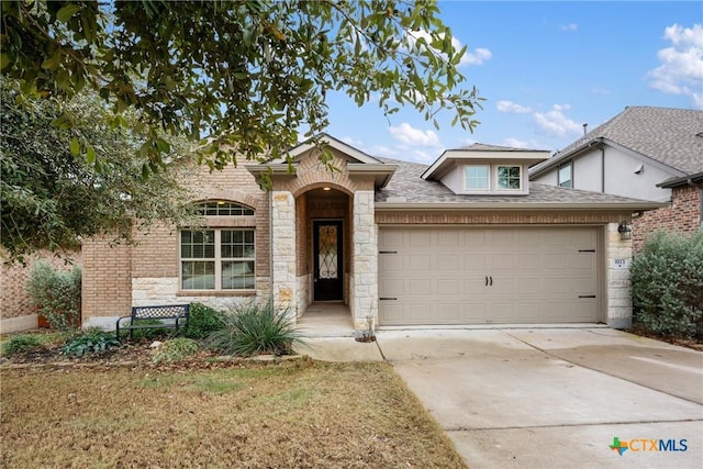 view of front of home with a garage