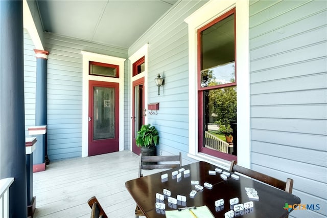 property entrance with a porch